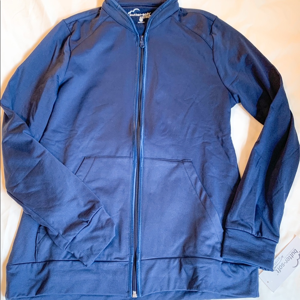 Womens fleece scrub jacket by “Butter Soft”.